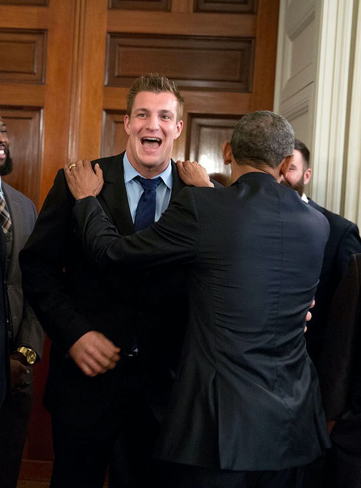 Colleagues laughing together at work